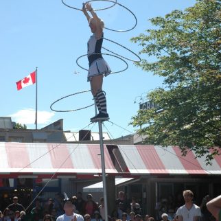 standing upon a pole hooping