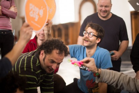Coworkers collaborate on a team exercise during workshop